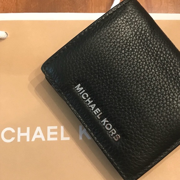 Michael Kors Handbags - Gorgeous Michael Kors pebbled black wallet ❤️